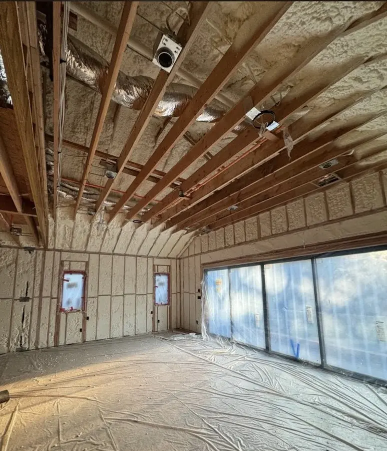 Interior walls and ceiling insulated with spray foam during new construction in Rayne